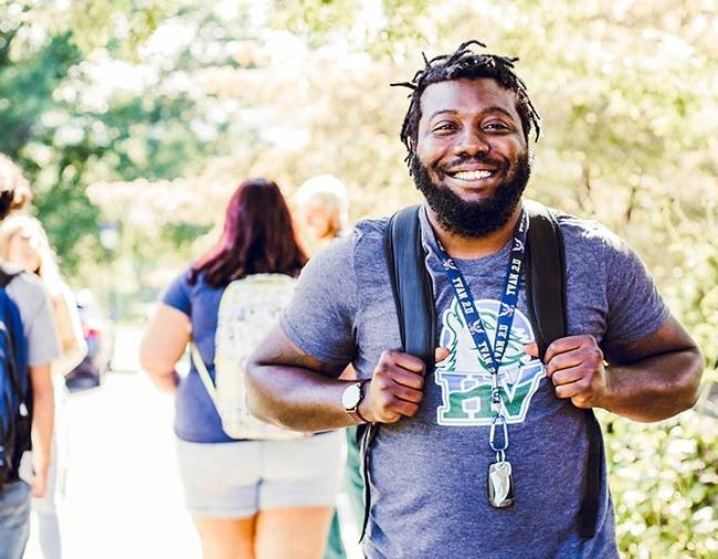 Veteran Walking Outside on campus